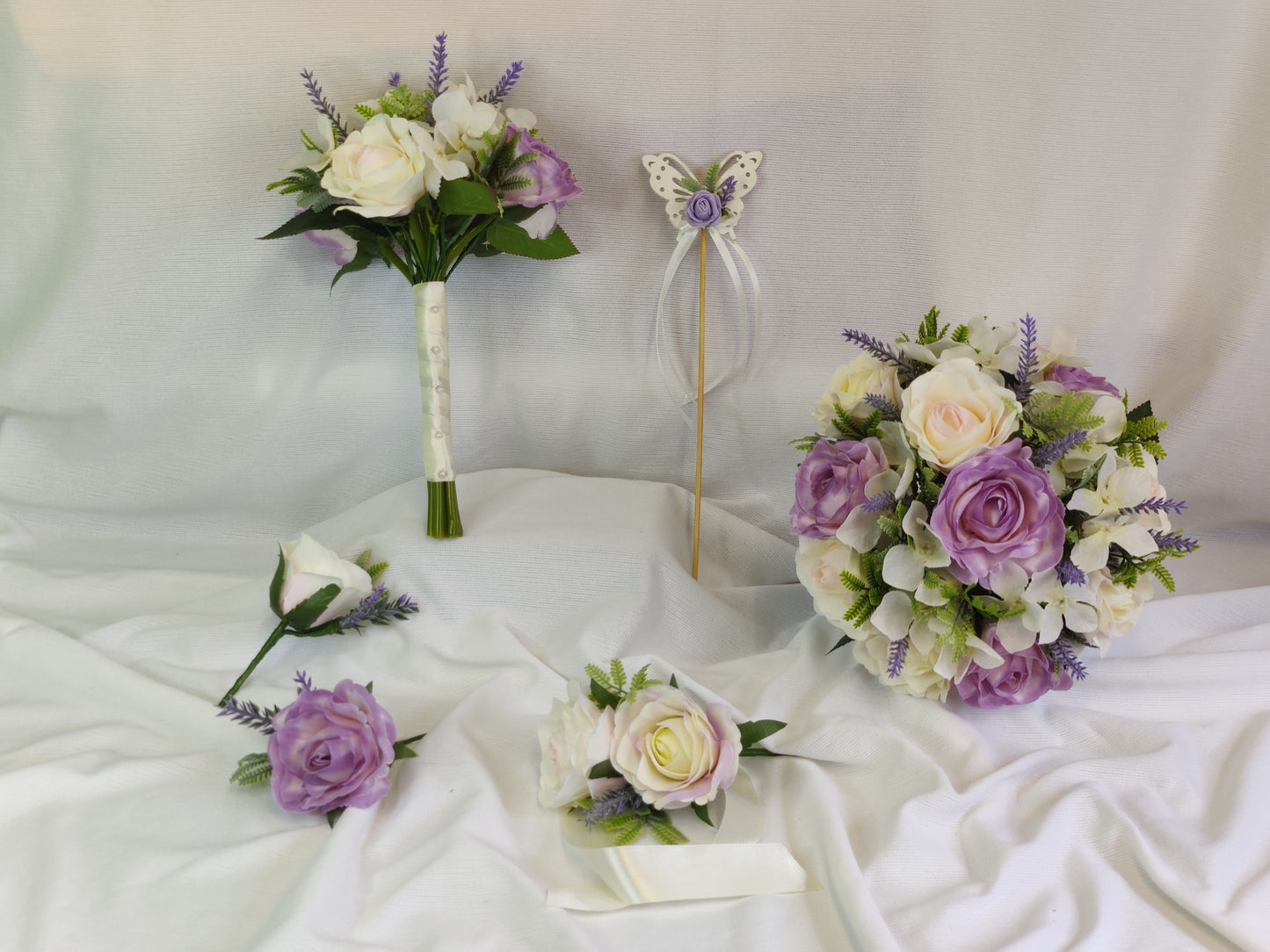 Pastel pink and purple rose wedding flowers