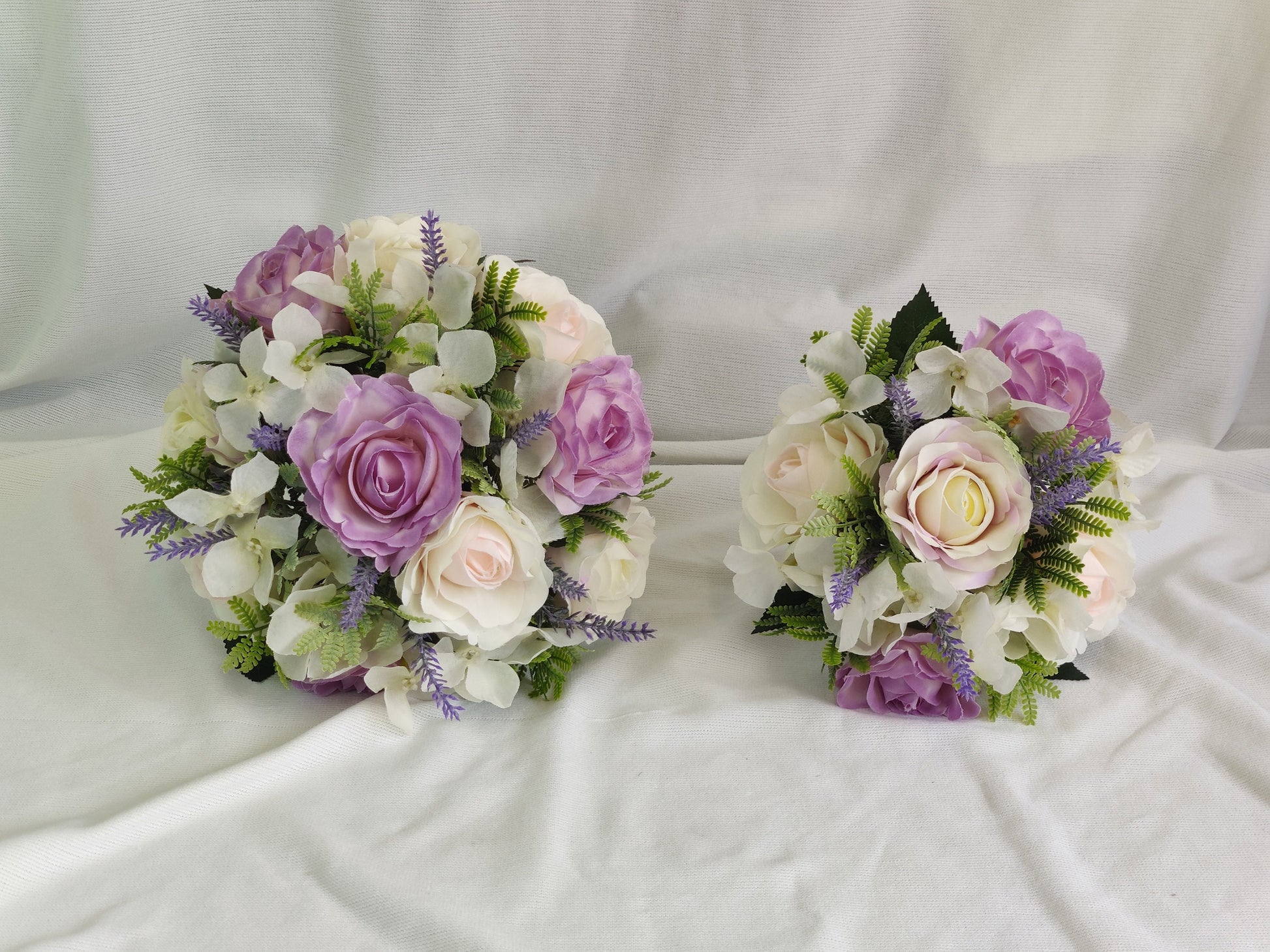 Pastel pink and purple rose wedding bouquet 
