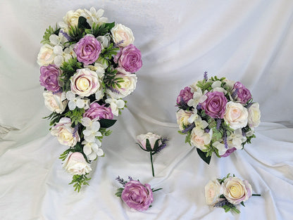Pastel pink and purple rose wedding flowers