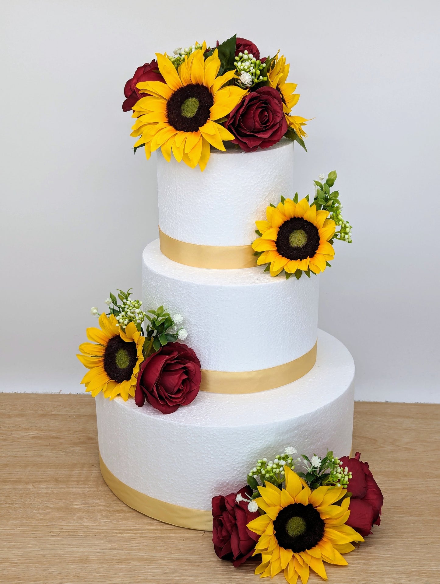 Burgundy rose and sunflower cake flowers and topper