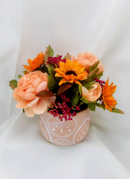 Autumn Arrangements in a terracotta Owl Pot