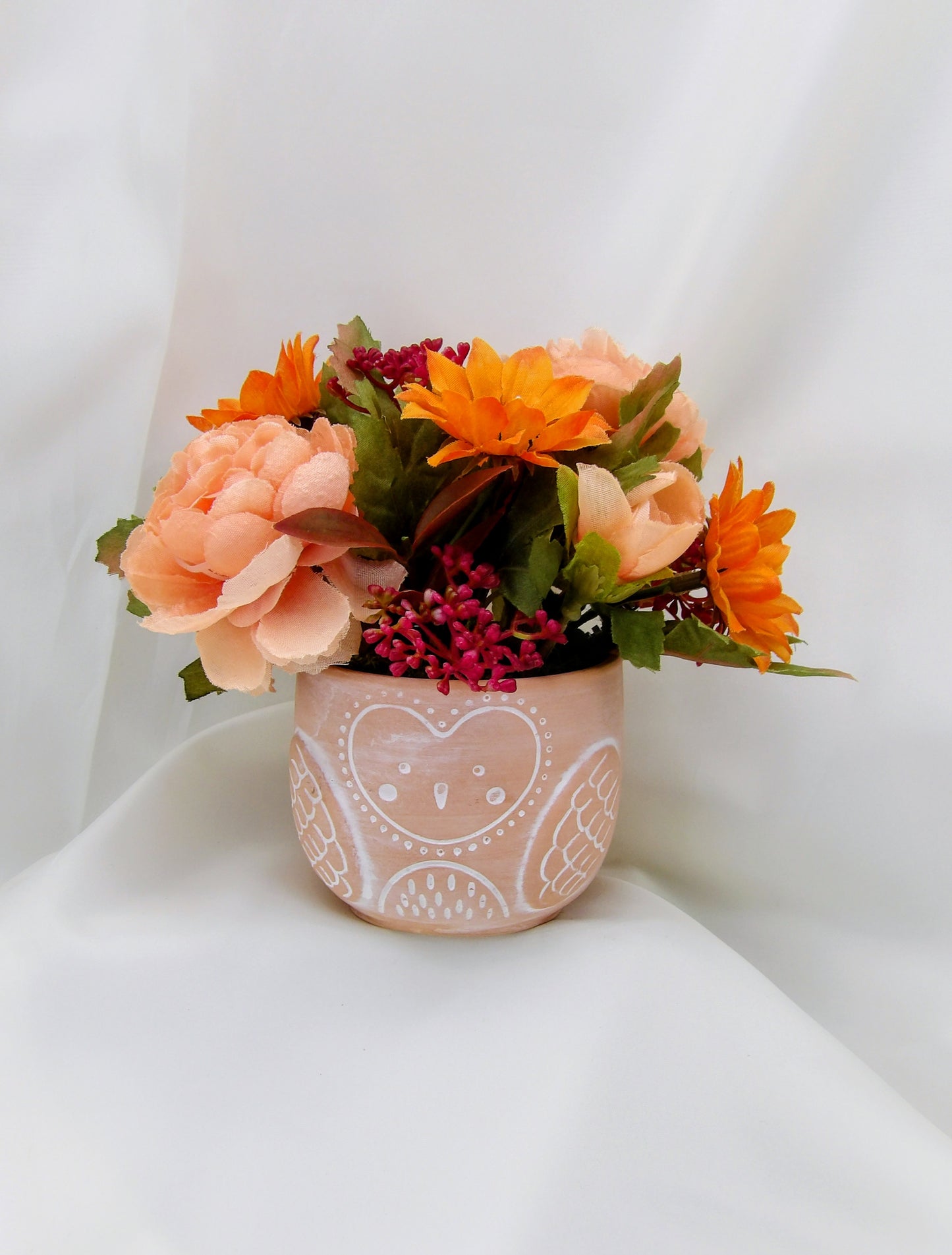 Autumn Arrangements in a terracotta Owl Pot