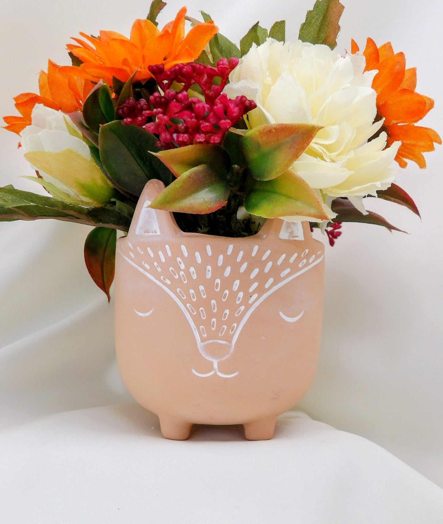 Autumn Arrangements in a terracotta Fox Pot