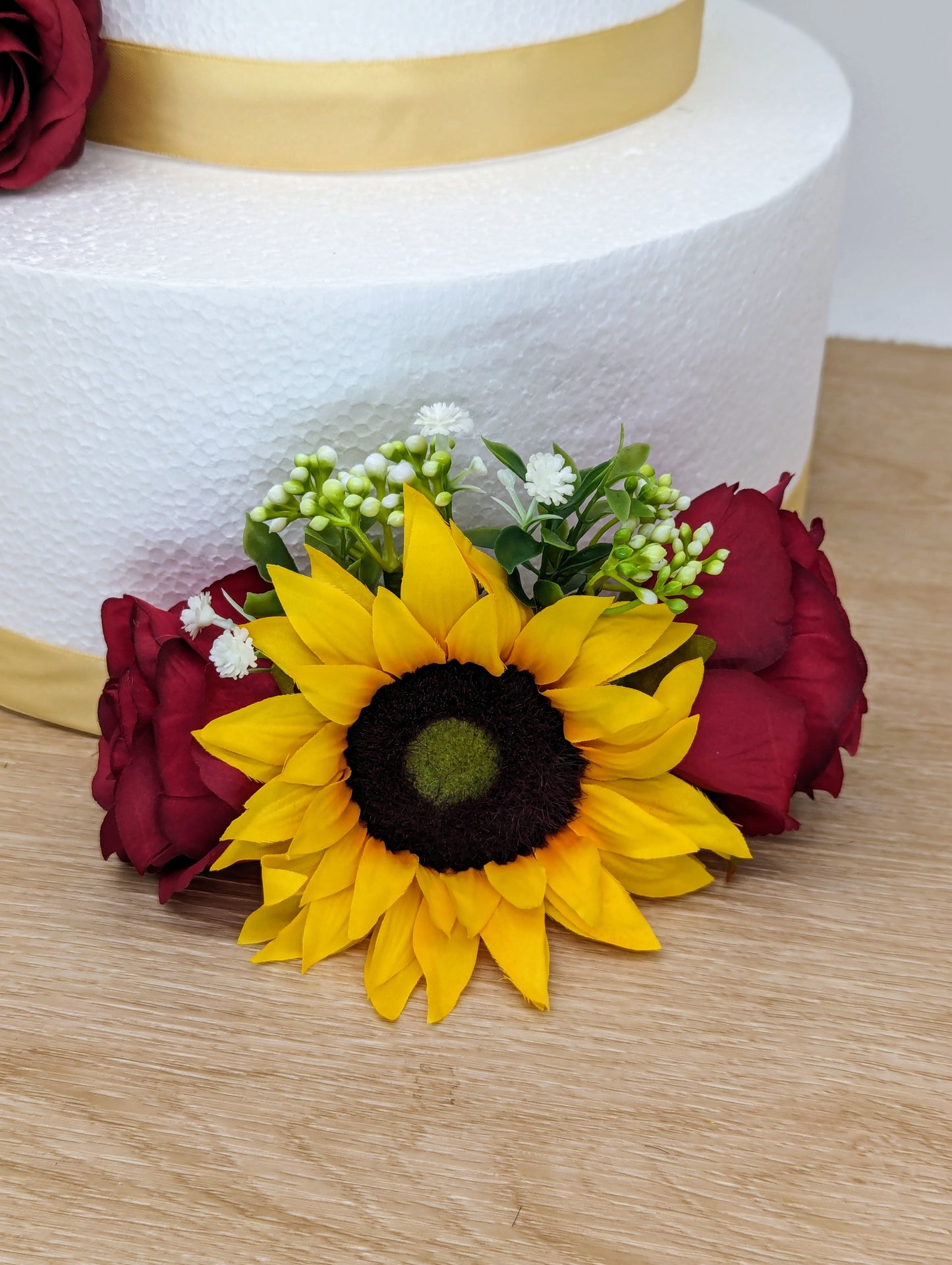Burgundy rose and sunflower cake flowers and topper