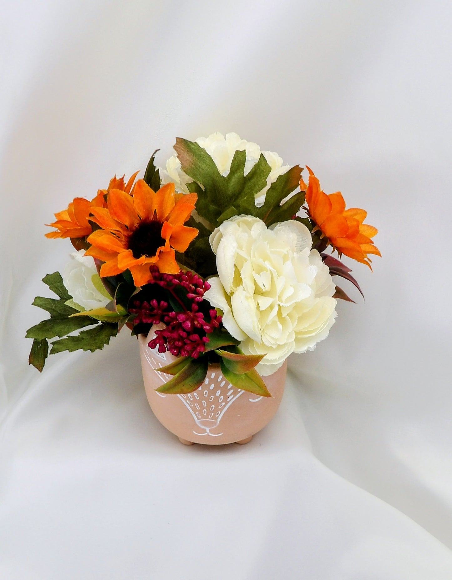 Autumn Arrangements in a terracotta Fox Pot