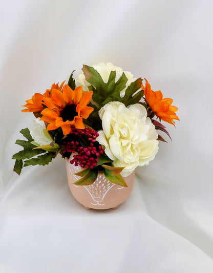 Autumn Arrangements in a terracotta Fox Pot