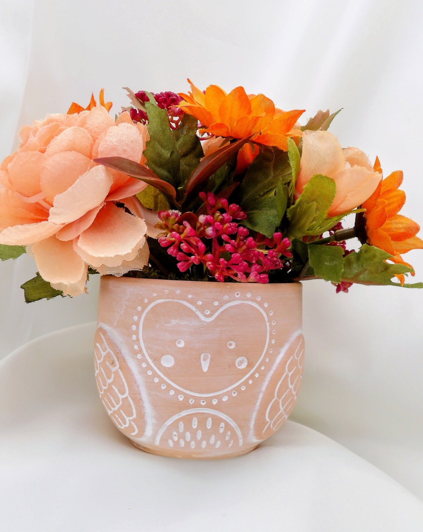 Autumn Arrangements in a terracotta Owl Pot