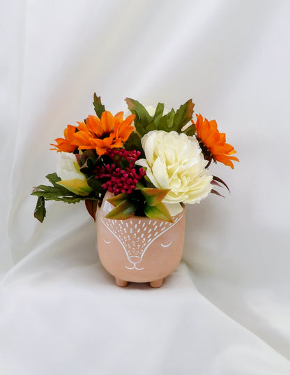 Autumn Arrangements in a terracotta Fox Pot